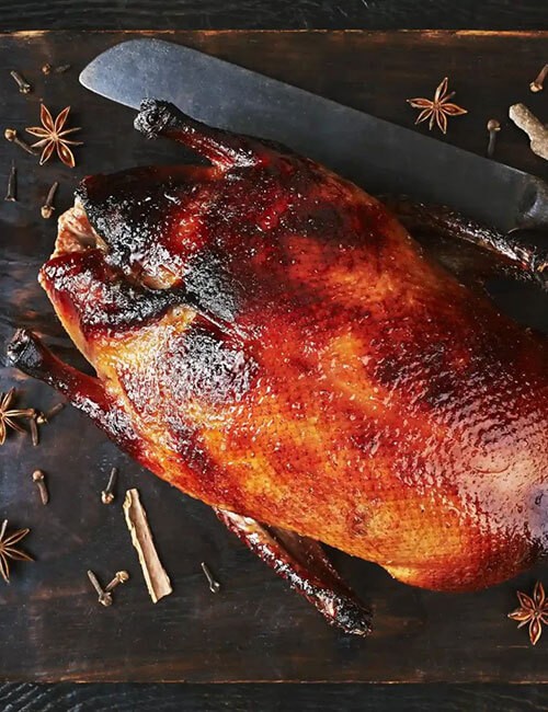 still-life-with-peking-duck-on-cutting-board-over.jpg